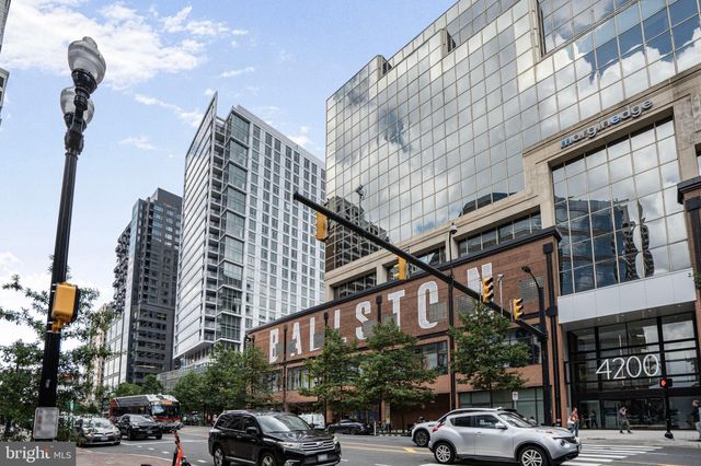 a view of a street with cars