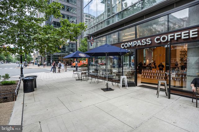 a view of street with sitting area