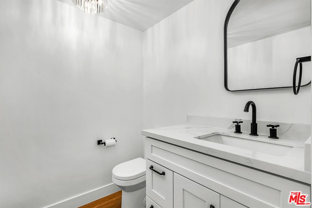 4425 Alla Road, Unit 5 Marina del Rey, CA 90292 - Photo 14 of 30 a bathroom with a toilet sink and mirror