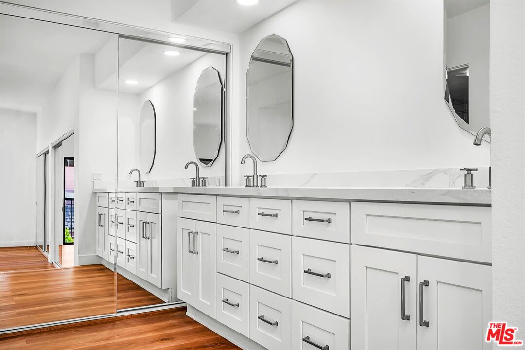 4425 Alla Road, Unit 5 Marina del Rey, CA 90292 - Photo 18 of 30 a bathroom with a double vanity sink and a mirror