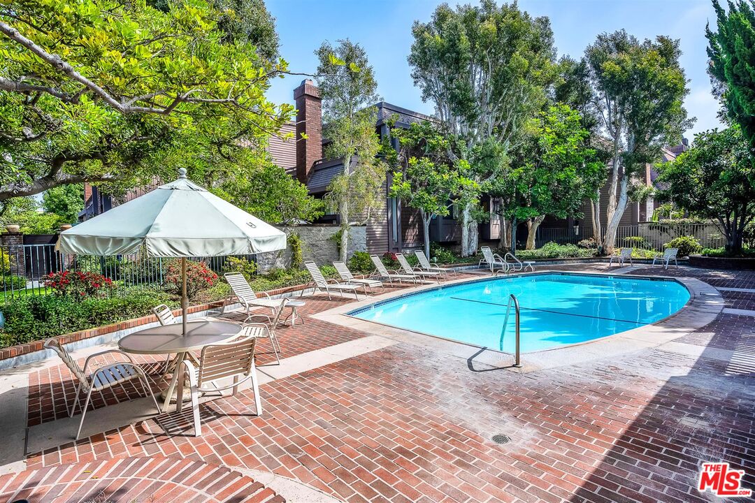 4425 Alla Road, Unit 5 Marina del Rey, CA 90292 - Photo 2 of 30 a view of a house with swimming pool and sitting area