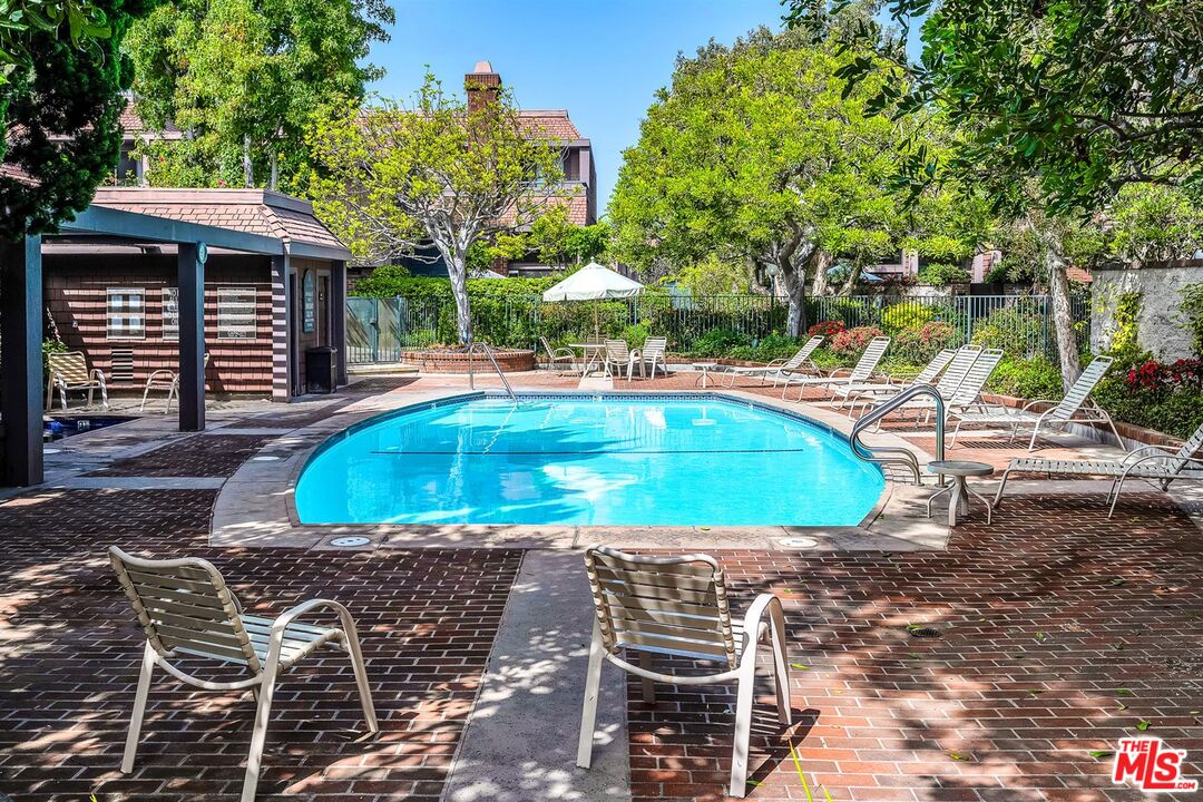 4425 Alla Road, Unit 5 Marina del Rey, CA 90292 - Photo 27 of 30 a view of a swimming pool with a patio