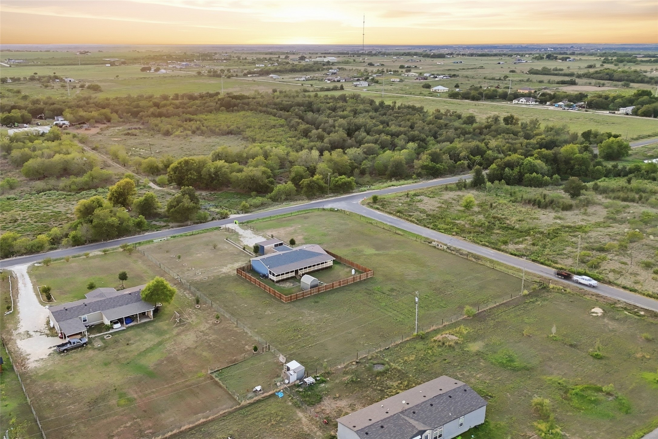 2709 County Road 463 Elgin, TX 78621 - Photo 30 of 32 A quiet rural landscape surrounds this expansive property under wide open horizons.