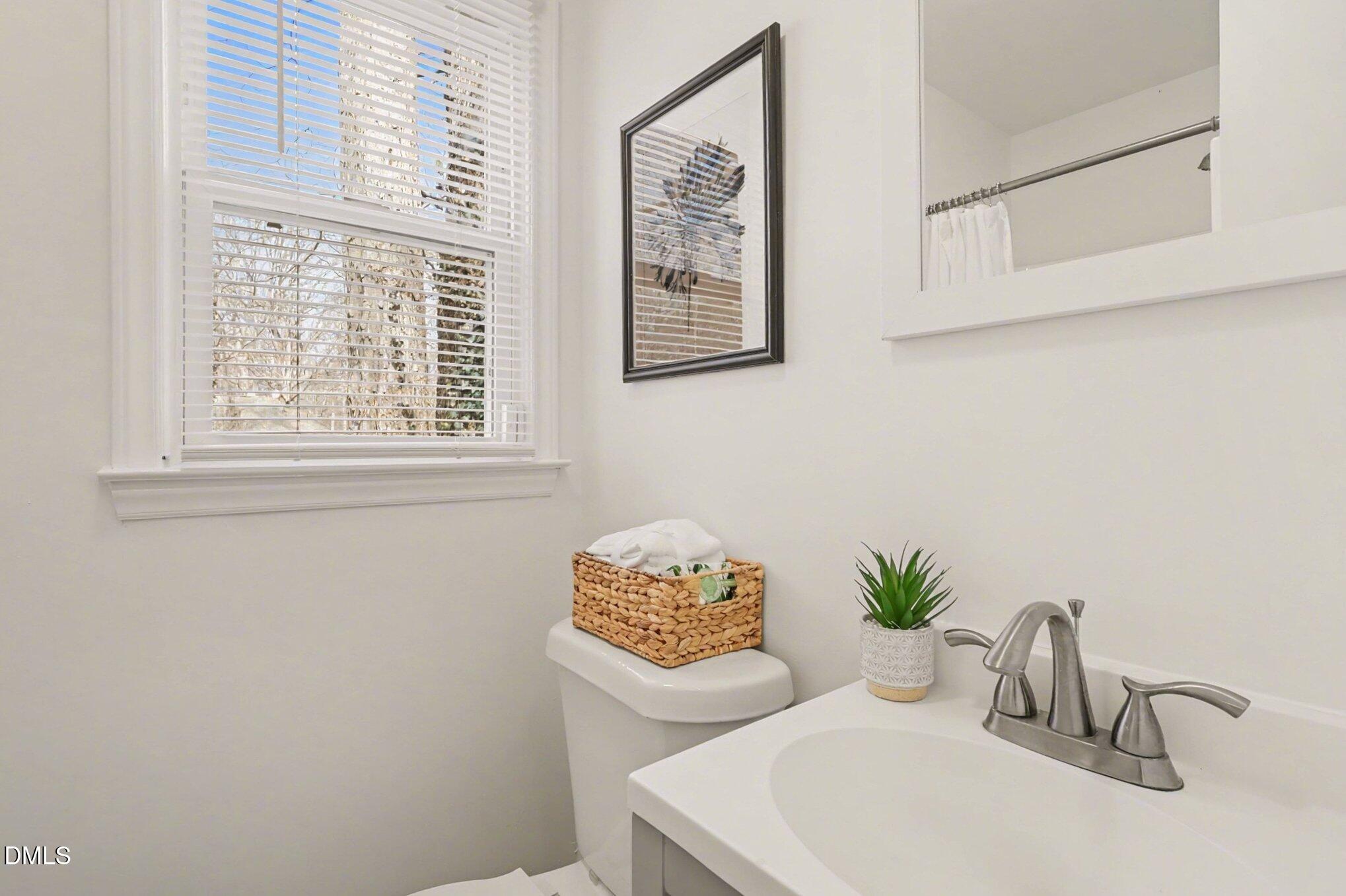 3043 Creech Road Garner, NC 27529 - Photo 17 of 38 a dining room with furniture and window