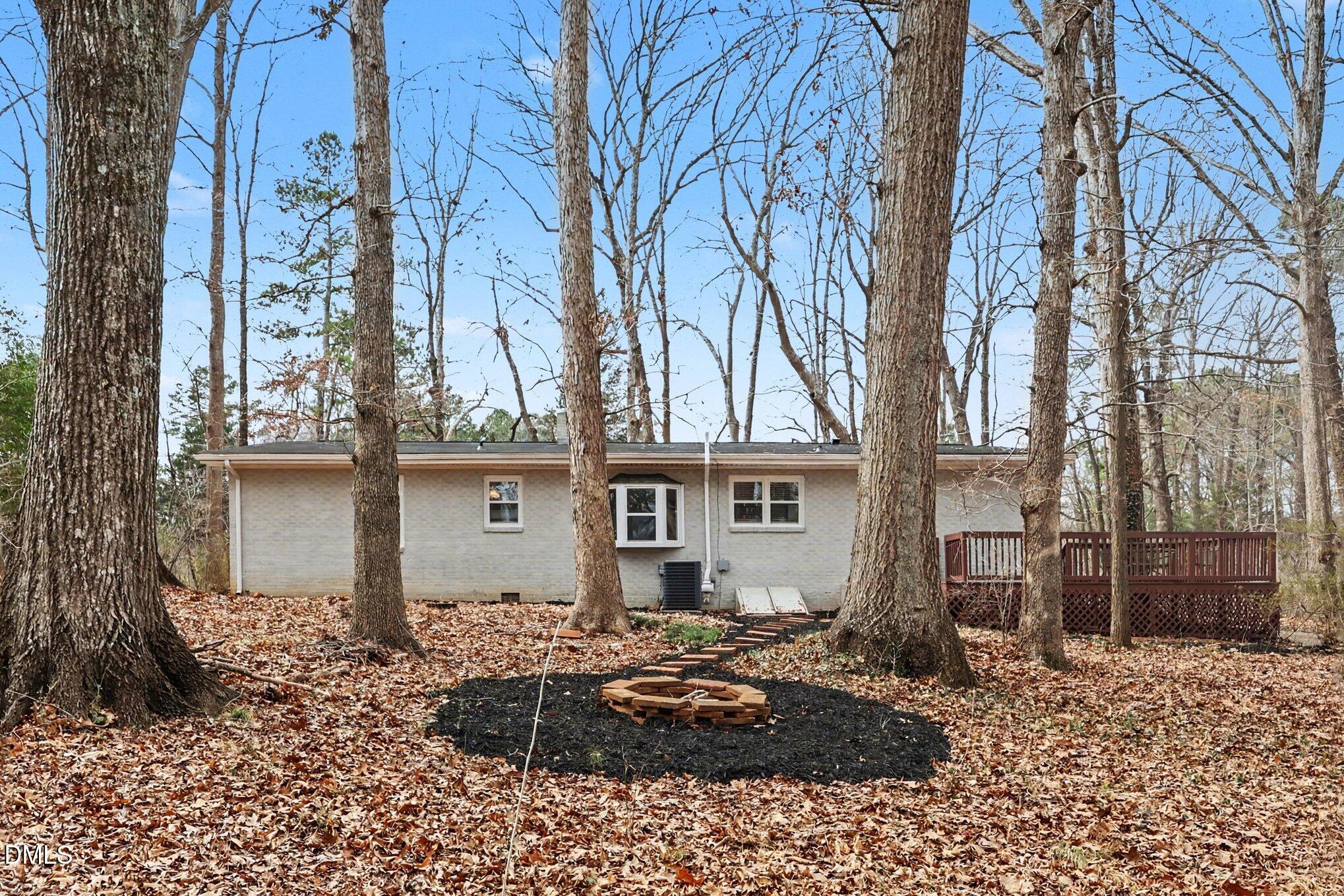 3043 Creech Road Garner, NC 27529 - Photo 27 of 38 a front view of a house with a yard