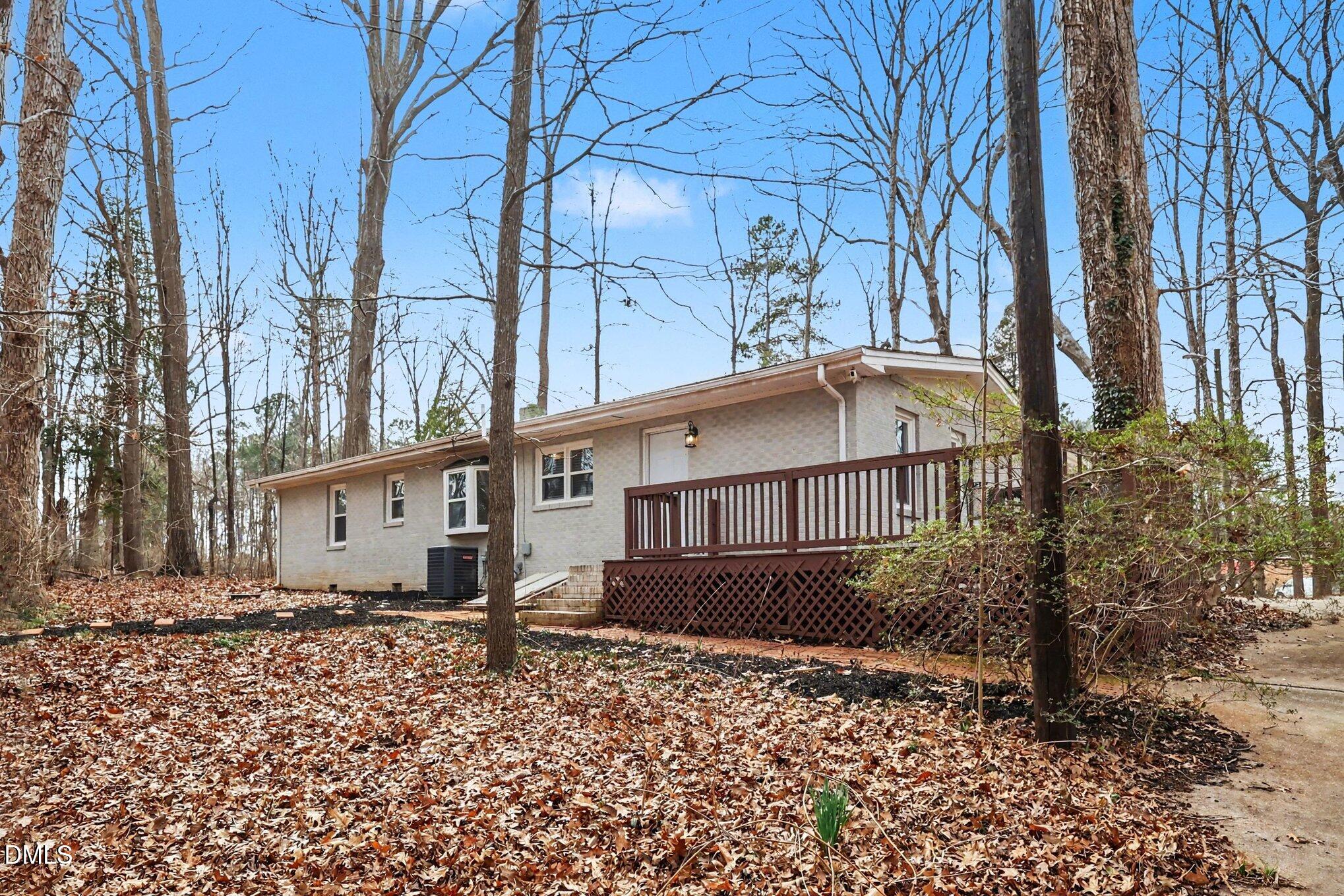 3043 Creech Road Garner, NC 27529 - Photo 29 of 38 a view of a house with a yard