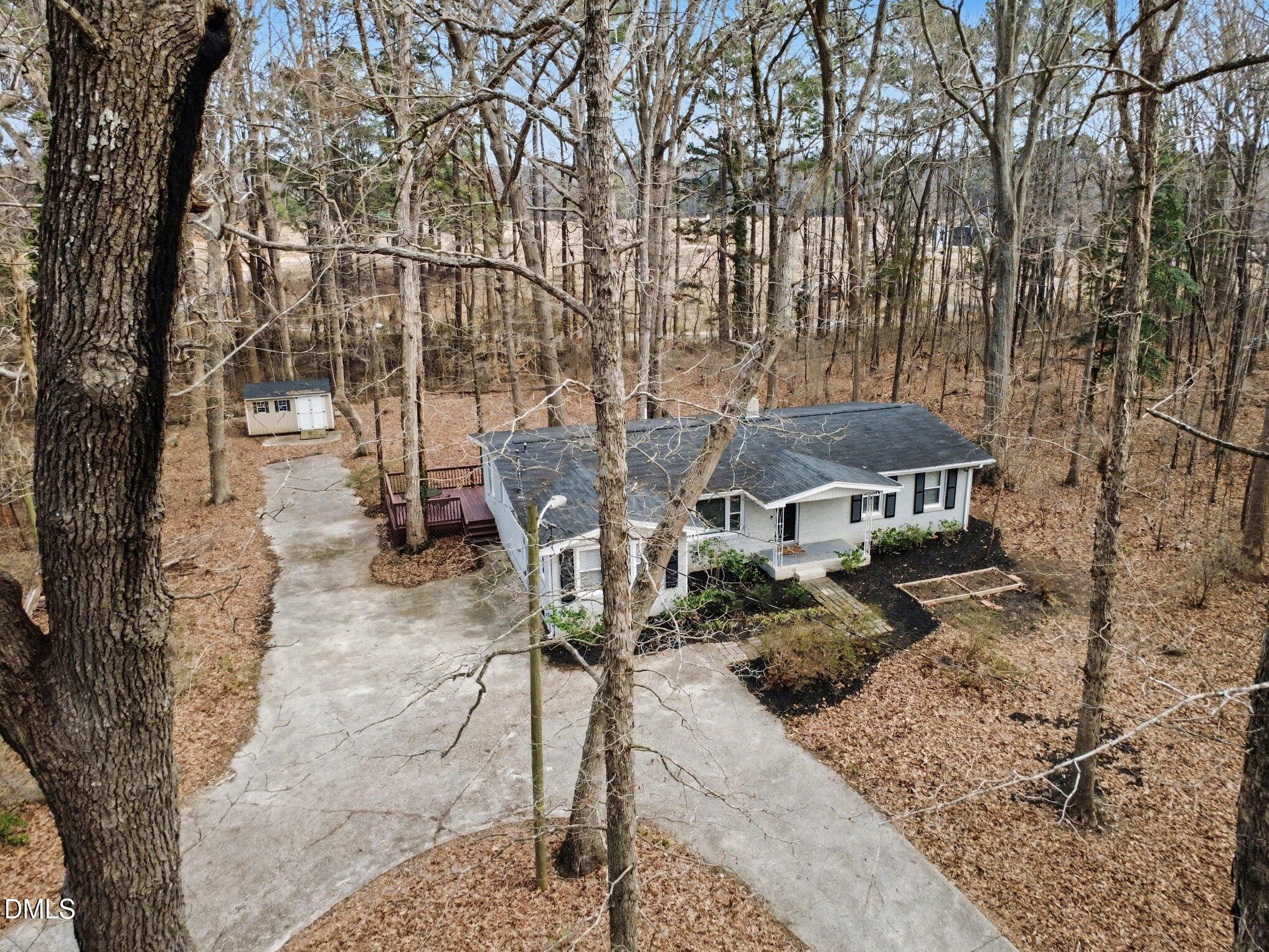 3043 Creech Road Garner, NC 27529 - Photo 2 of 38 a view of a house with backyard and sitting area