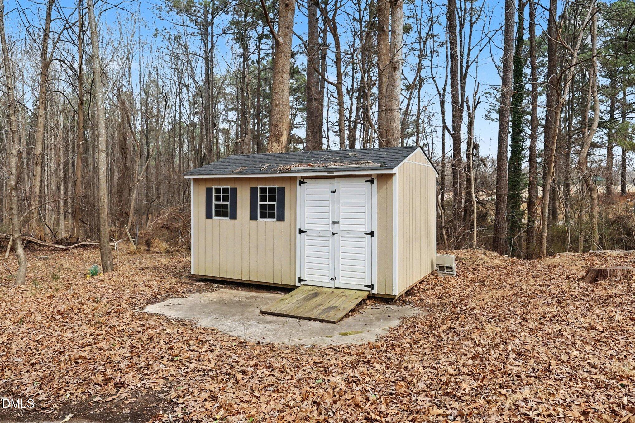 3043 Creech Road Garner, NC 27529 - Photo 31 of 38 a front view of a house with a yard