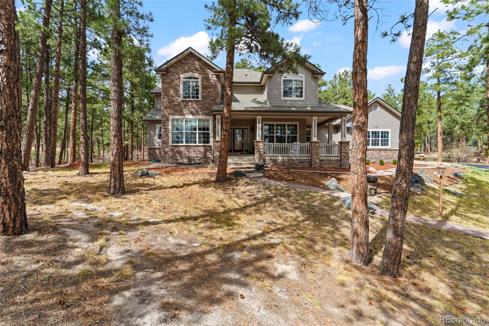 1767 Cinnamon Road Larkspur, CO 80118 - Photo 1 of 50 Gallery Image 1