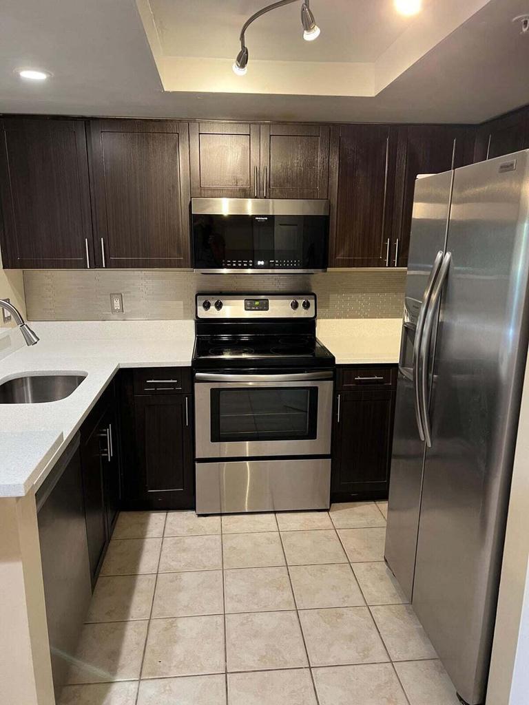 4151 Haverhill Road, Unit 1504 West Palm Beach, FL 33417 - Photo 2 of 14 IMG_9385