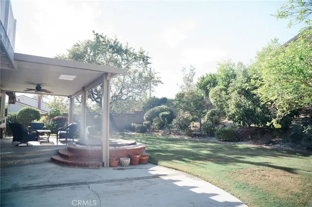a view of backyard with green space