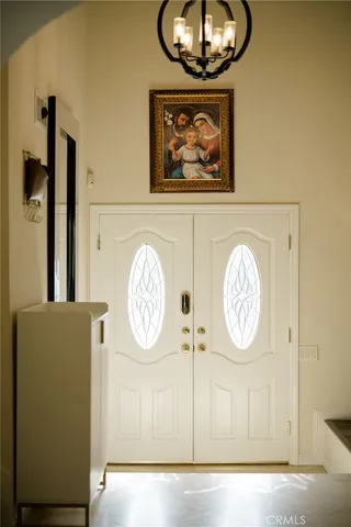 a view of a hallway with elevator