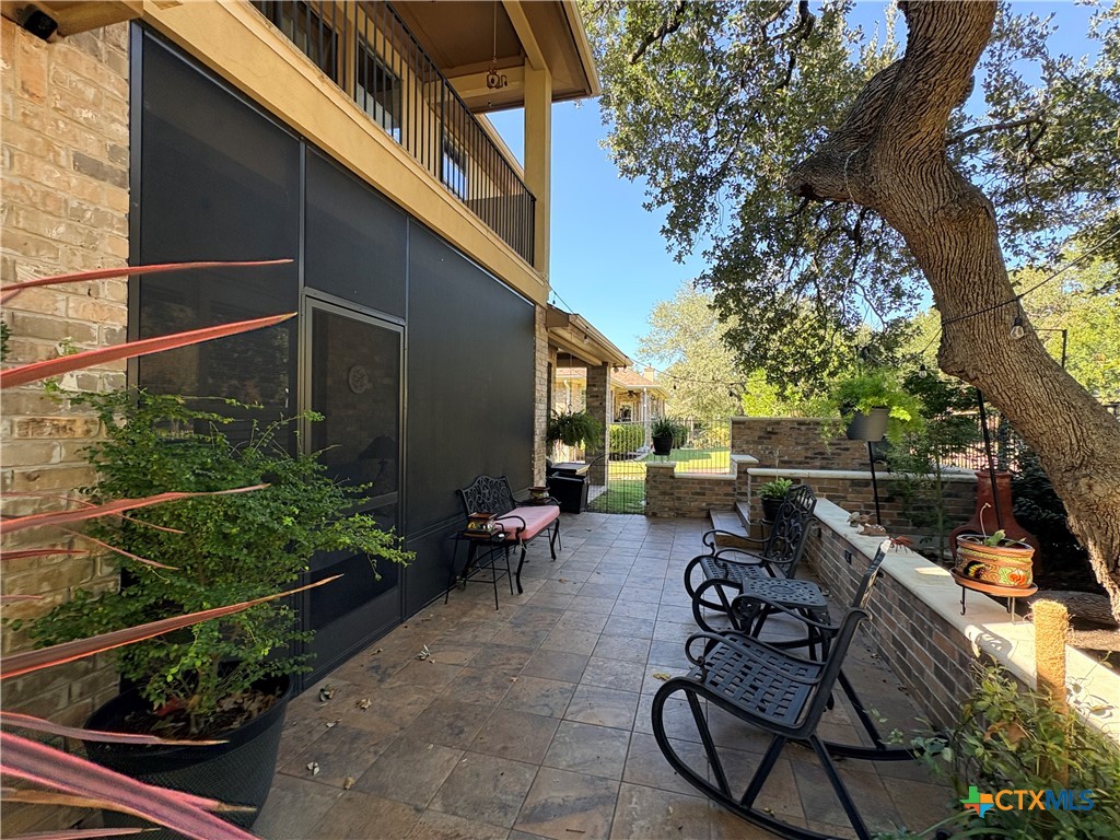 4802 Hidden Springs Trail Georgetown, TX 78633 - Photo 5 of 8 a view of backyard with outdoor seating and plants