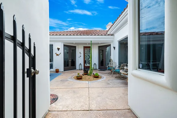 a view of a entryway door front of house