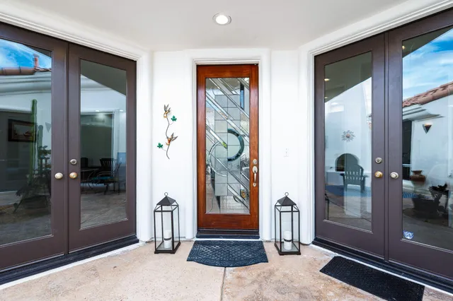 a view of a entryway door front of a house