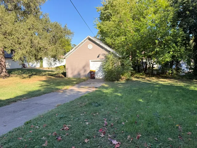 a view of backyard with green space