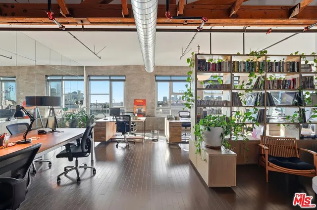 a room with lots of stuff and furniture