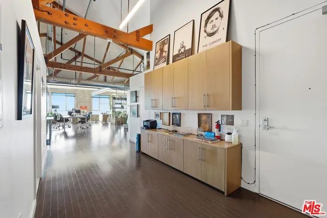 a view of a livingroom with furniture and wooden floor