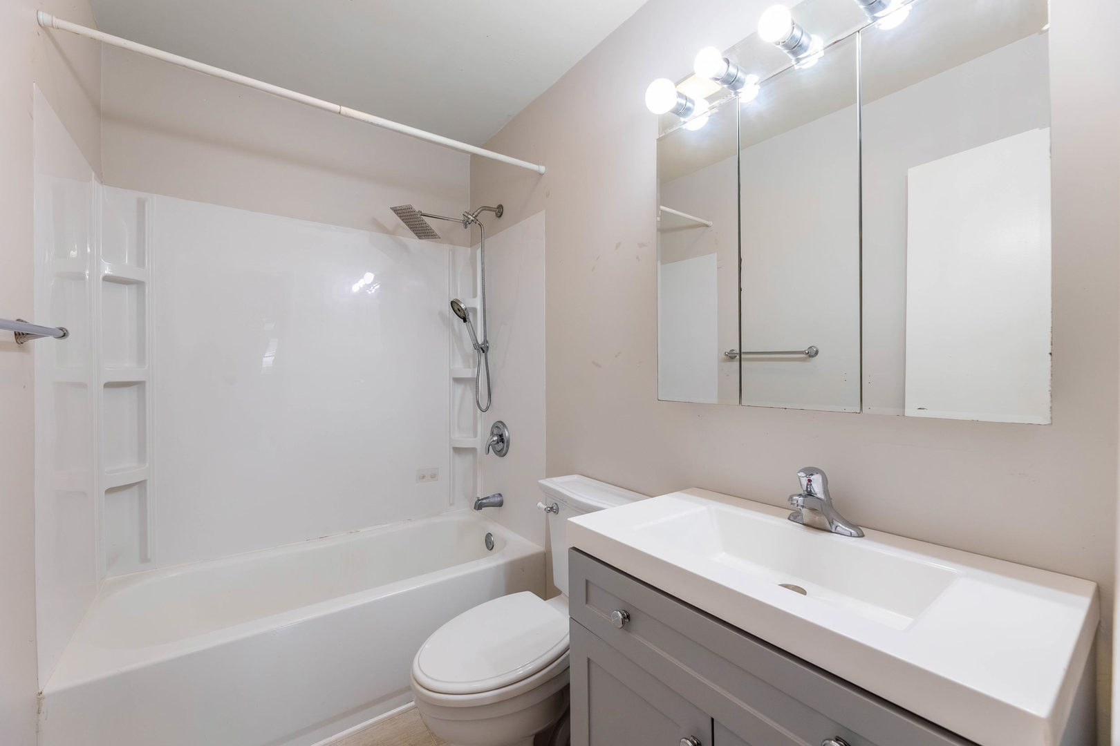 14901 Richmond Avenue Posen, IL 60469 - Photo 12 of 33 a bathroom with a bathtub shower sink vanity and toilet
