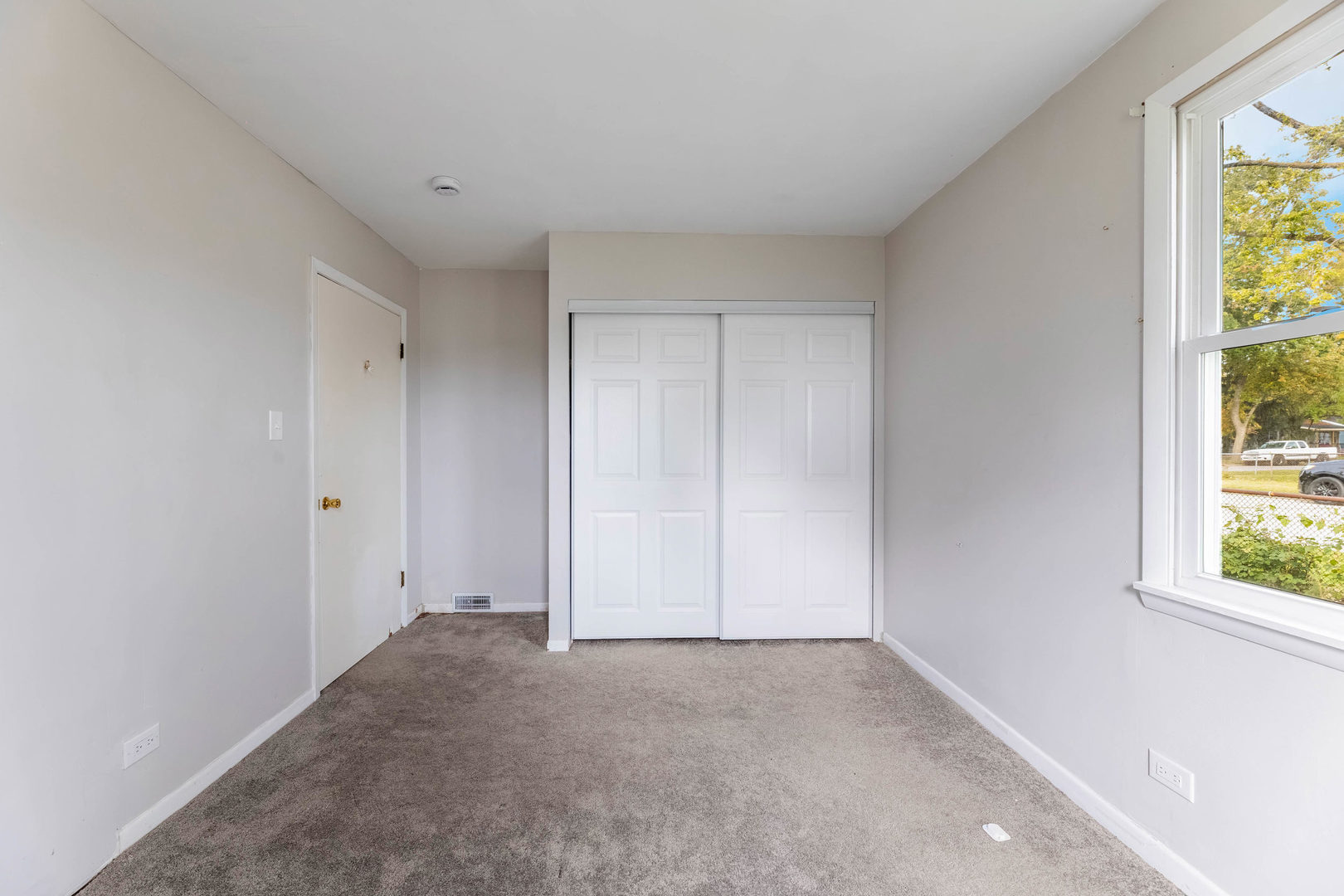 14901 Richmond Avenue Posen, IL 60469 - Photo 18 of 33 a view of an empty room with a window