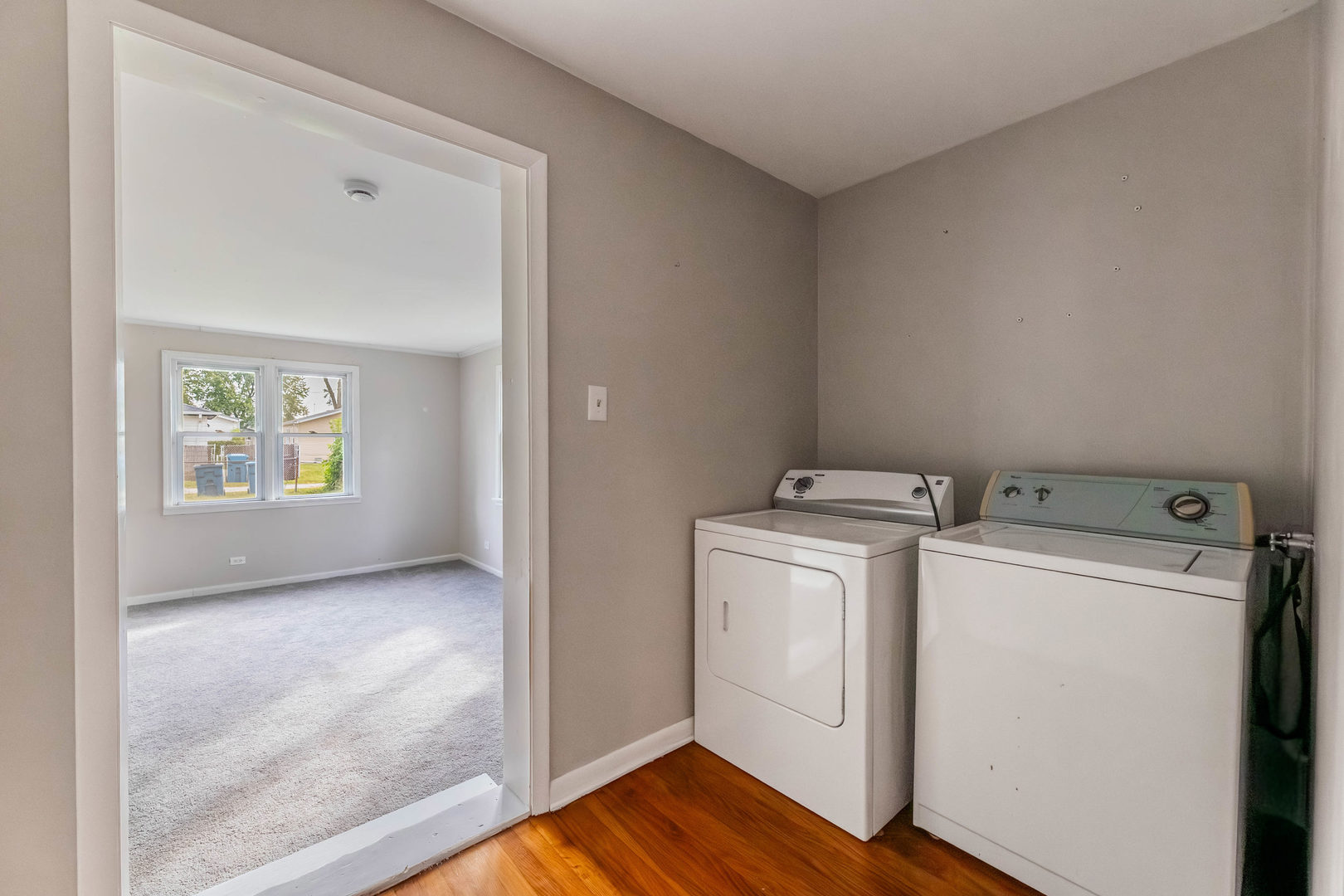 14901 Richmond Avenue Posen, IL 60469 - Photo 19 of 33 a view of a storage & utility room with washer and dryer