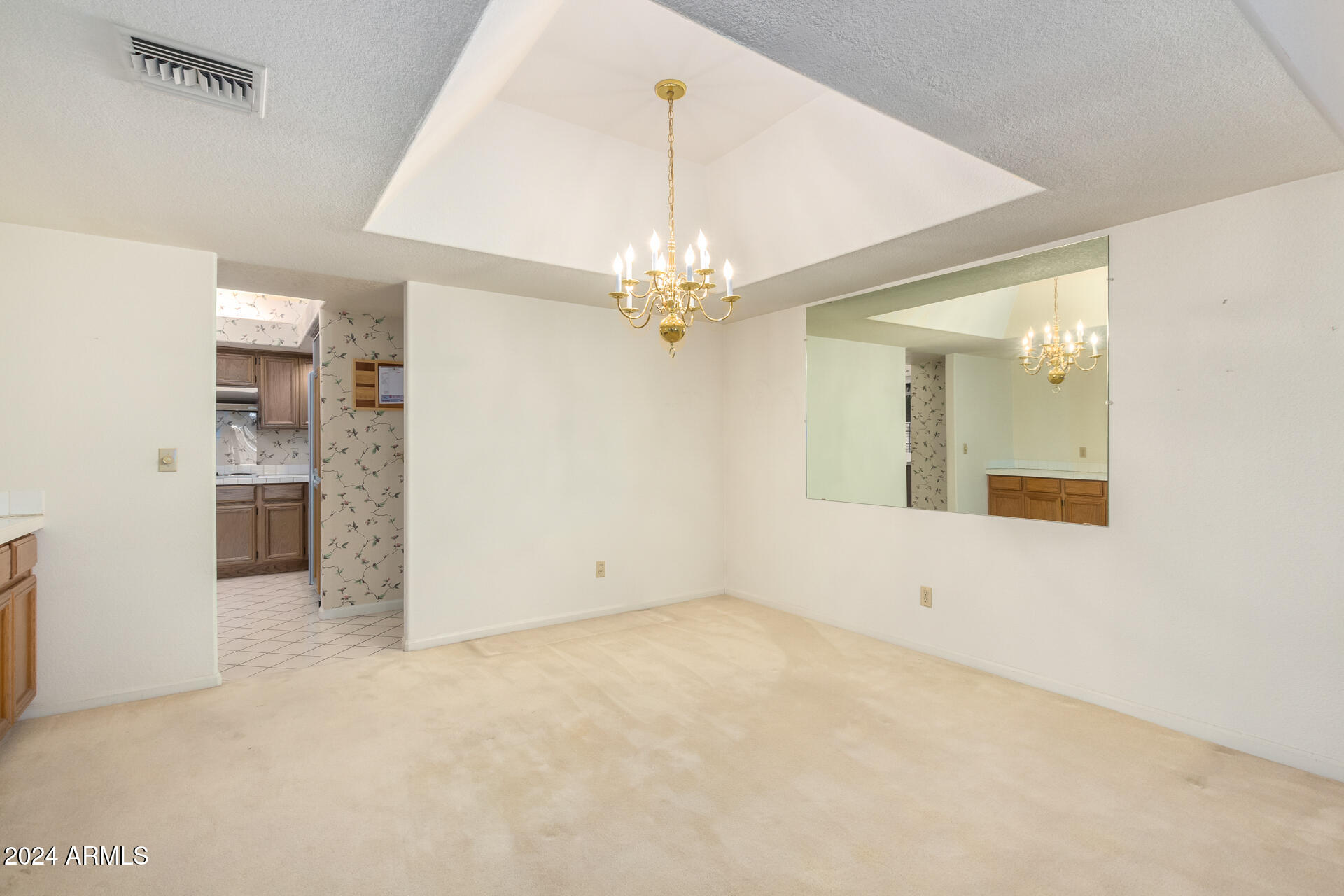 8100 East Camelback Road, Unit 159 Scottsdale, AZ 85251 - Photo 9 of 43 Formal dining room with tray ceiling