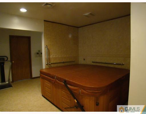 26 Stiles Road Edison, NJ 08817 - Photo 7 of 9 a room with water heater