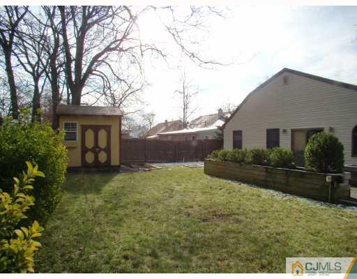26 Stiles Road Edison, NJ 08817 - Photo 8 of 9 a view of a house with backyard and garden