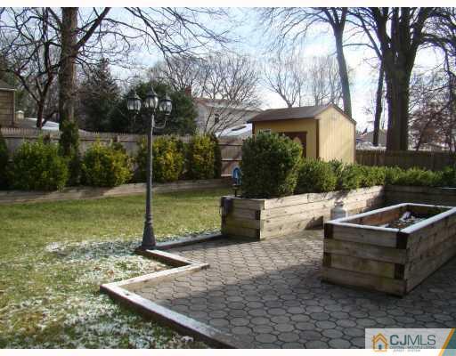 26 Stiles Road Edison, NJ 08817 - Photo 9 of 9 a view of a couches in a patio
