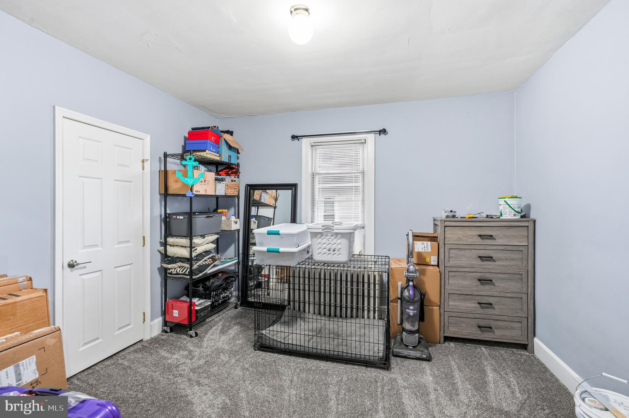 227 Heulings Avenue Riverside, NJ 08075 - Photo 27 of 45 a bedroom with furniture and a wooden floor