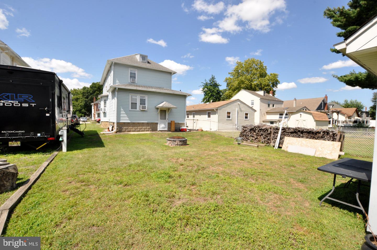 227 Heulings Avenue Riverside, NJ 08075 - Photo 37 of 45 a swimming pool with outdoor seating and yard