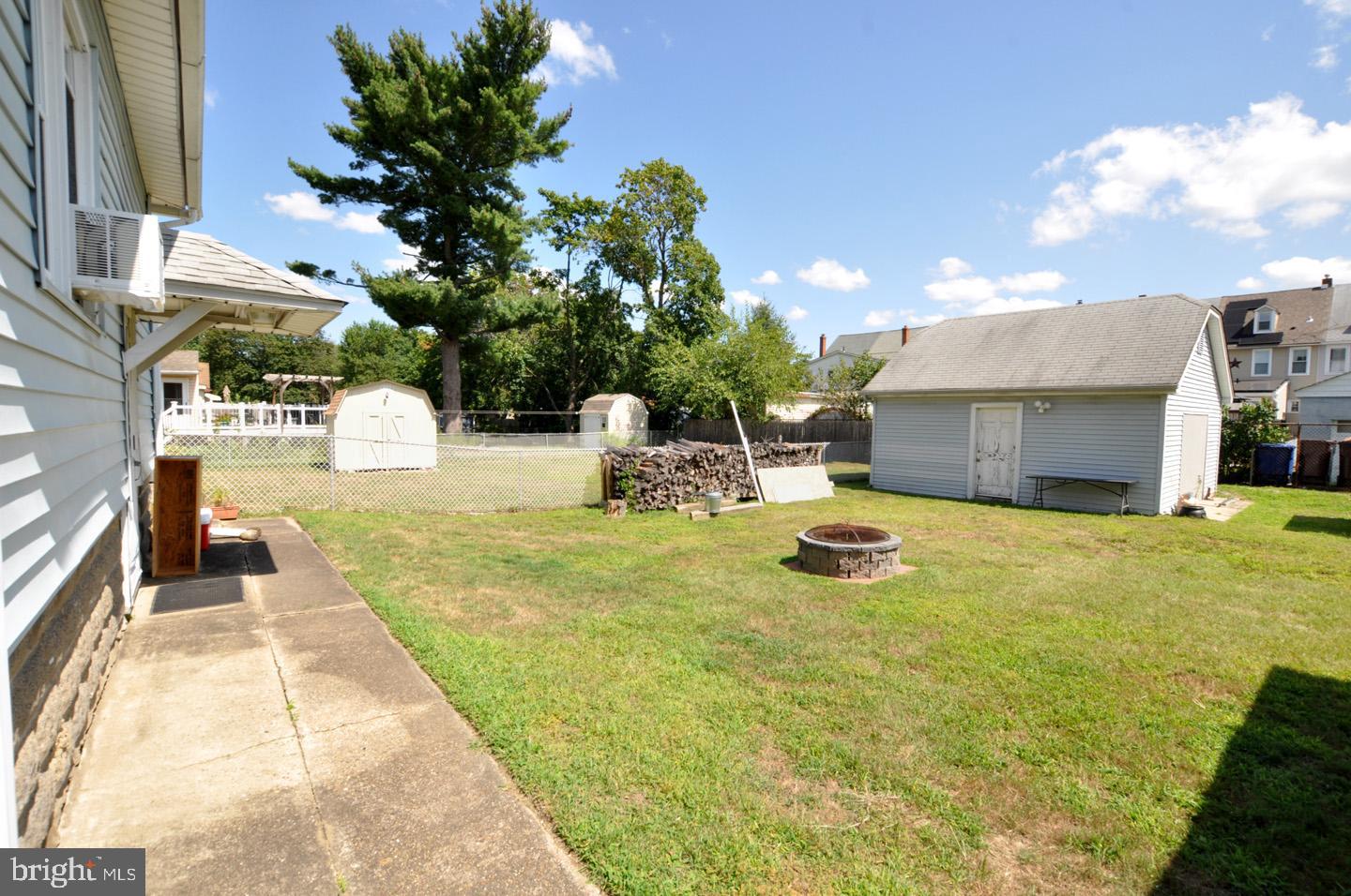 227 Heulings Avenue Riverside, NJ 08075 - Photo 39 of 45 a swimming pool with outdoor seating and yard