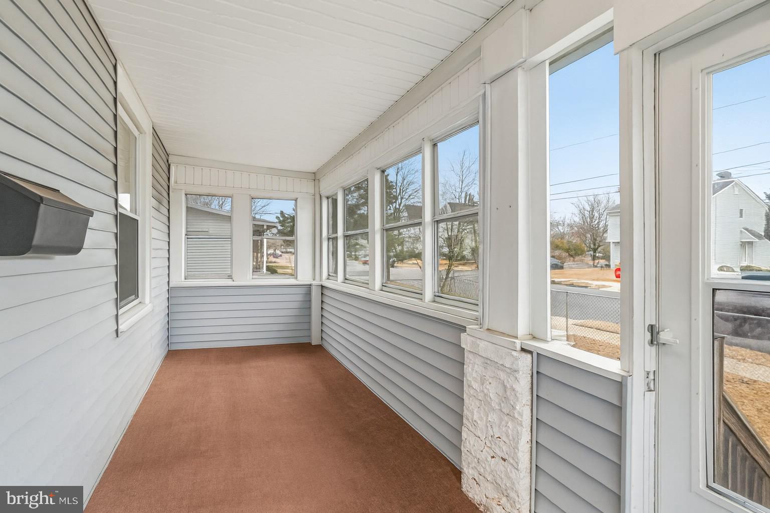 227 Heulings Avenue Riverside, NJ 08075 - Photo 6 of 45 a view of a hallway with wooden floor and staircase