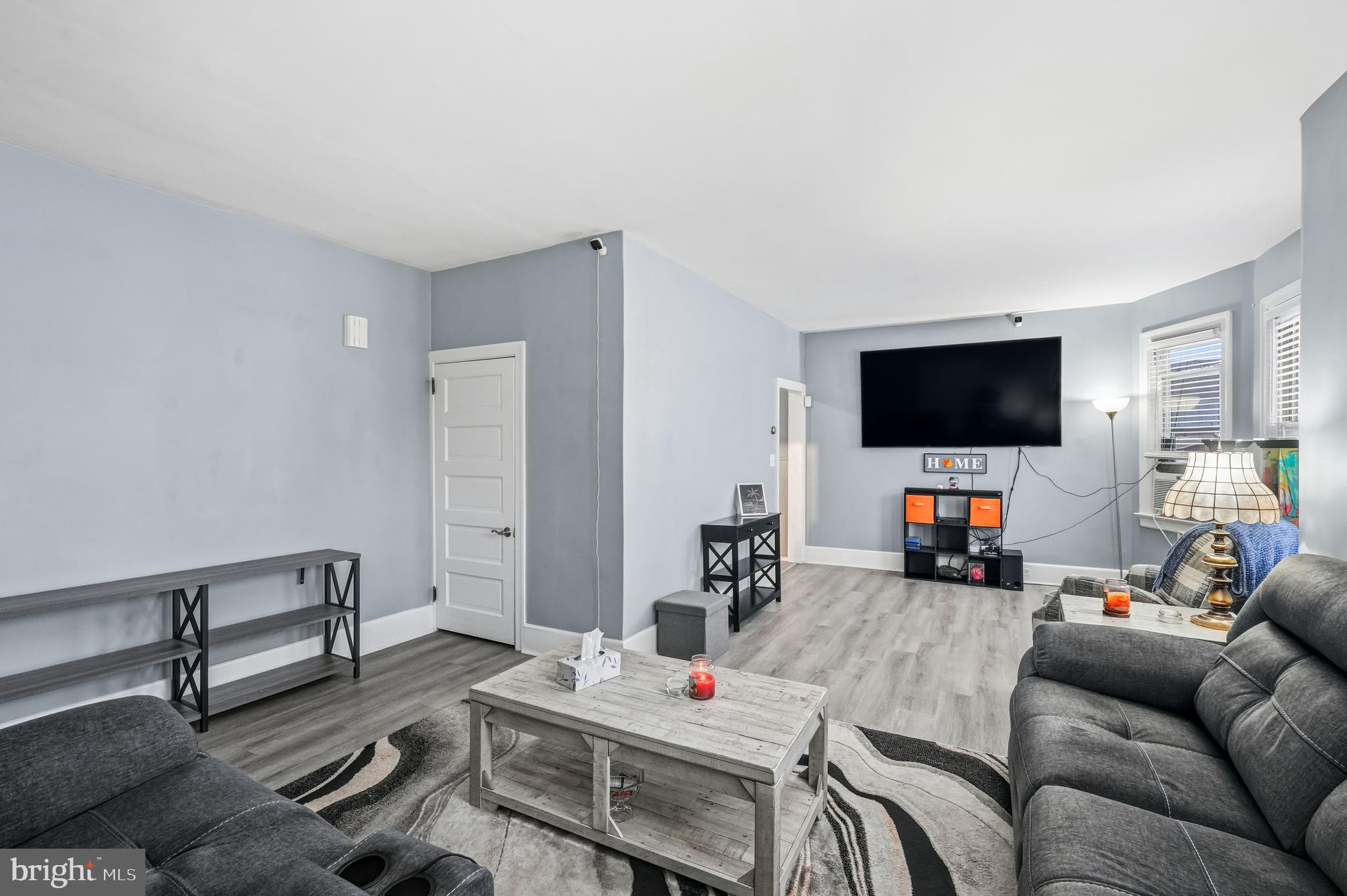 227 Heulings Avenue Riverside, NJ 08075 - Photo 9 of 45 a living room with furniture and a flat screen tv
