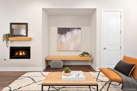 a bedroom with bed and a large window