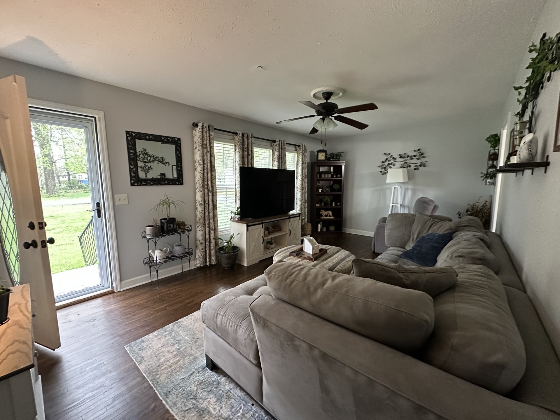 1903 Susan Drive Murfreesboro, TN 37129 - Photo 3 of 11 a living room with furniture and a flat screen tv
