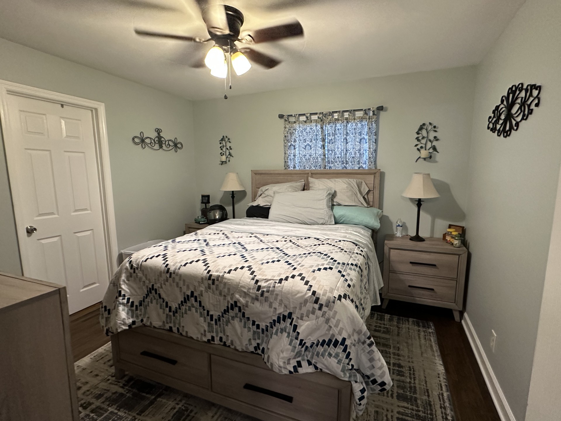 1903 Susan Drive Murfreesboro, TN 37129 - Photo 5 of 11 a bedroom with a bed and a chandelier