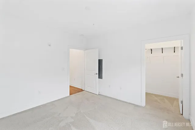 a bathroom with a shower and a toilet