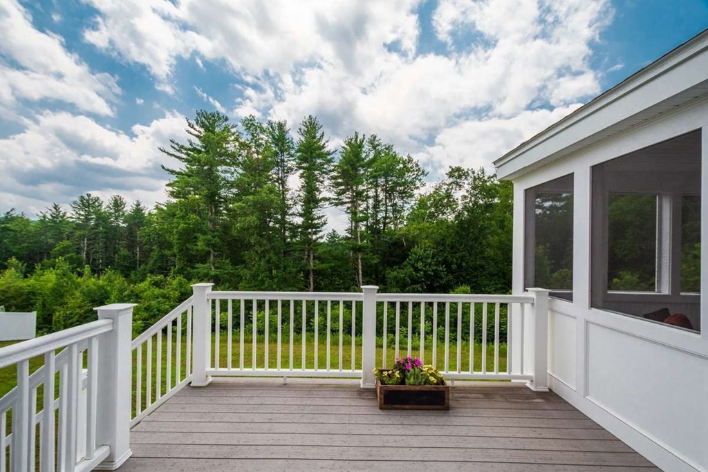 3 Quail Ridge Road Merrimac, MA 01860 - Photo 12 of 36 a view of a wooden deck and a yard