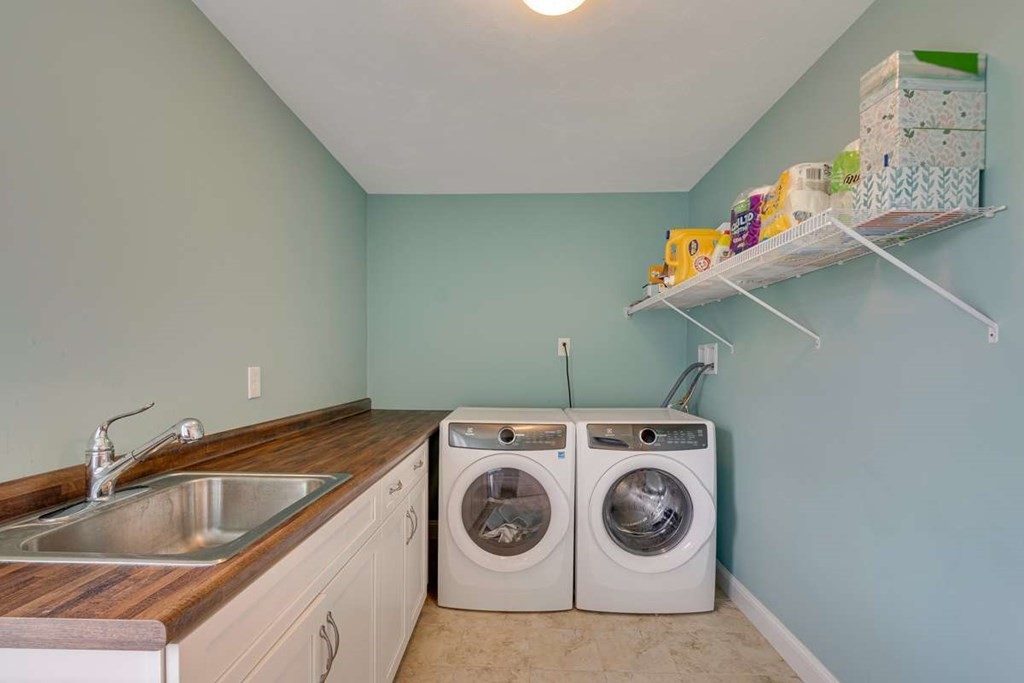 3 Quail Ridge Road Merrimac, MA 01860 - Photo 17 of 36 a utility room with dryer and washer