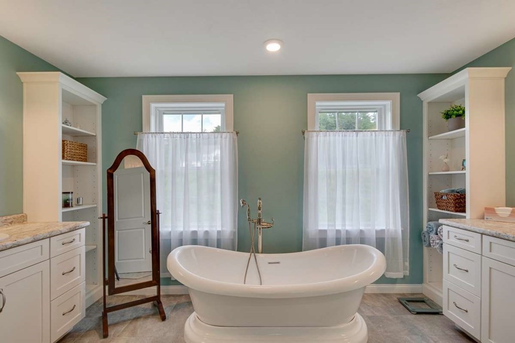 3 Quail Ridge Road Merrimac, MA 01860 - Photo 24 of 36 a bathroom with a sink a toilet and a bathtub