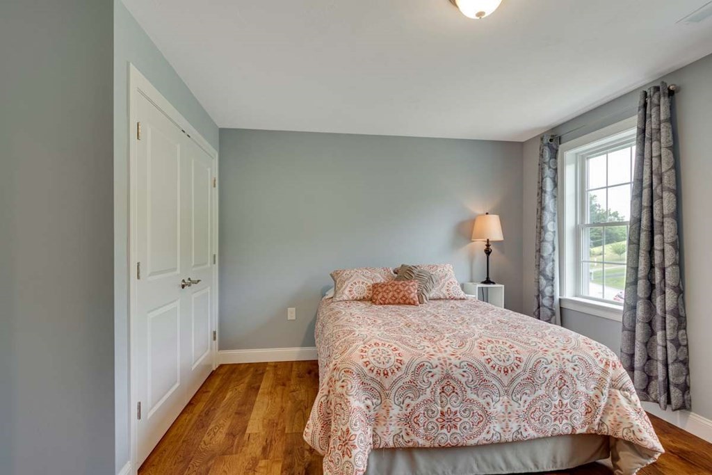 3 Quail Ridge Road Merrimac, MA 01860 - Photo 28 of 36 a bedroom with a bed and a window