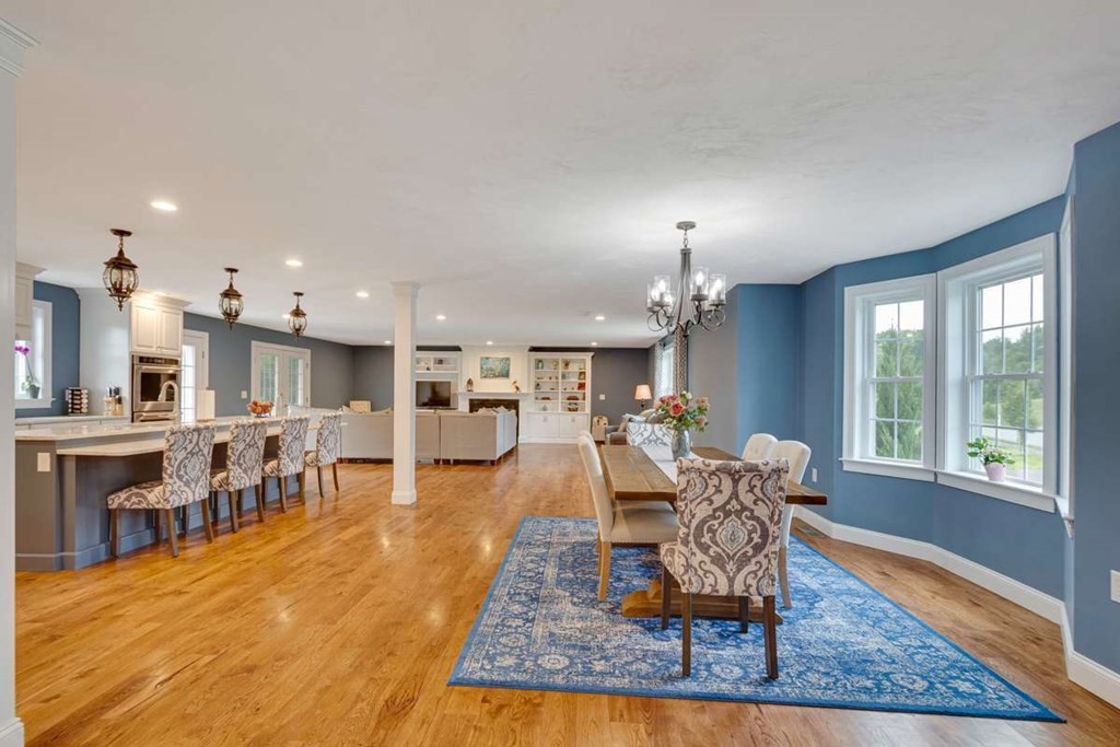 3 Quail Ridge Road Merrimac, MA 01860 - Photo 3 of 36 a living room with furniture and a table