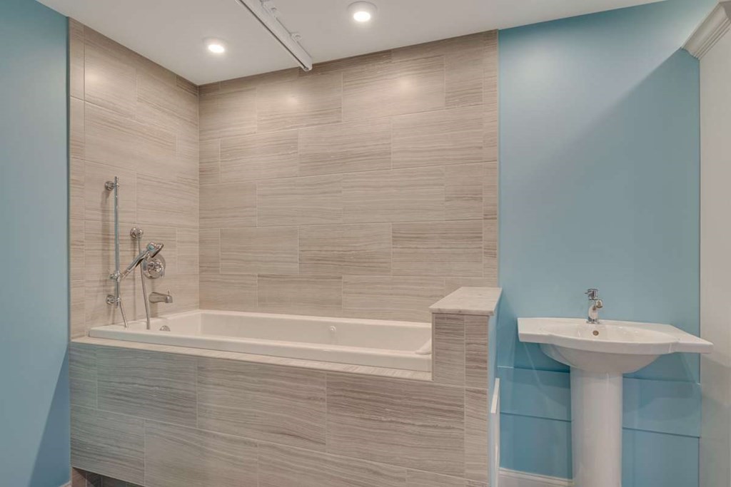3 Quail Ridge Road Merrimac, MA 01860 - Photo 35 of 36 a bathroom with a sink and mirror