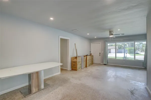 a view of an empty room with a window