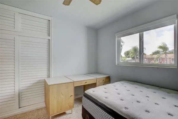 a view of living room with furniture and floor to ceiling window