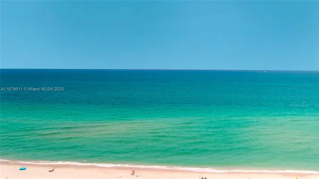a view of a swimming pool with a lounge chairs