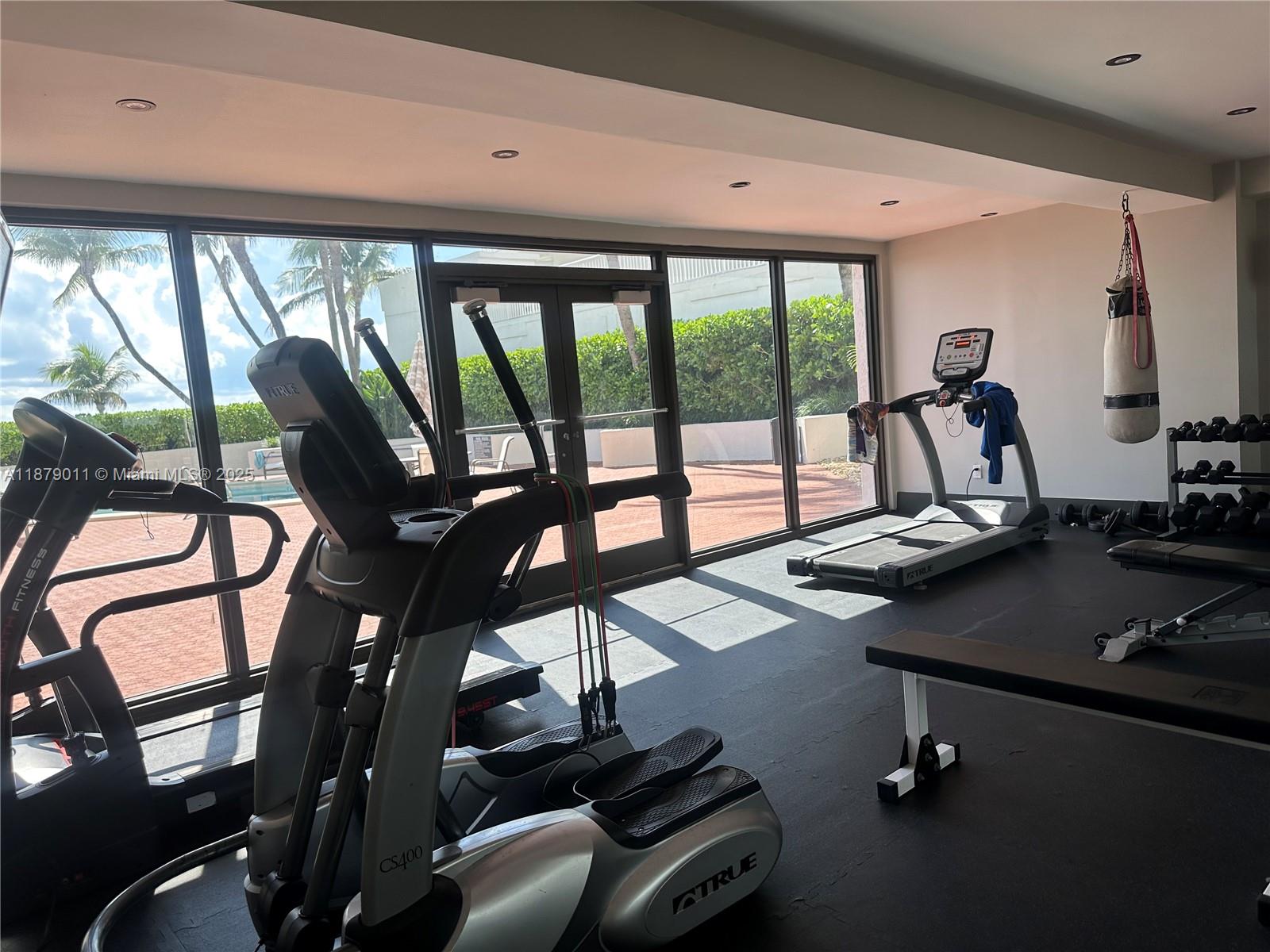 5415 Collins Avenue, Unit 302A Miami Beach, FL 33140 - Photo 14 of 20 a view of a room with gym equipment