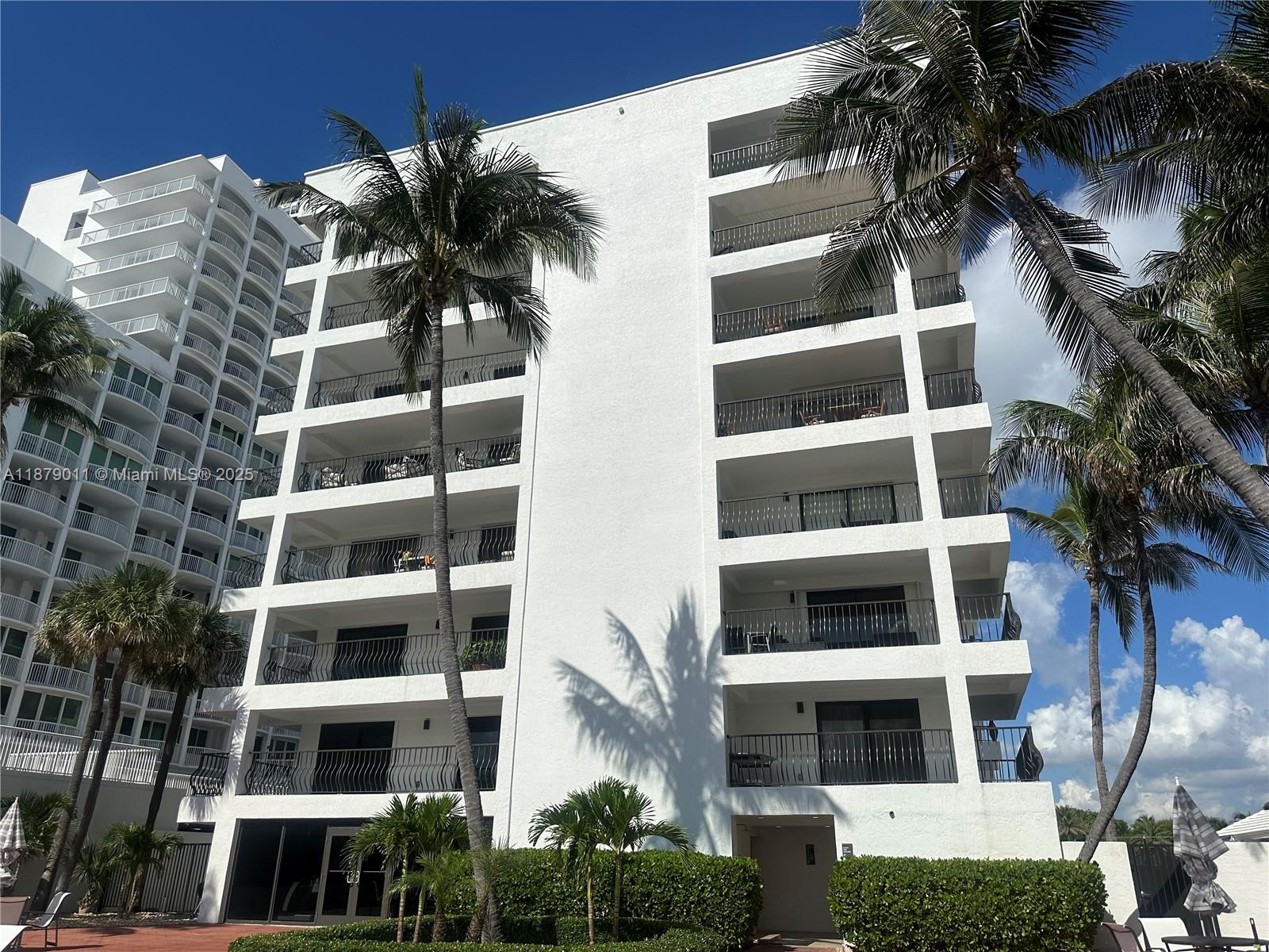 5415 Collins Avenue, Unit 302A Miami Beach, FL 33140 - Photo 19 of 20 a front view of a multi story building