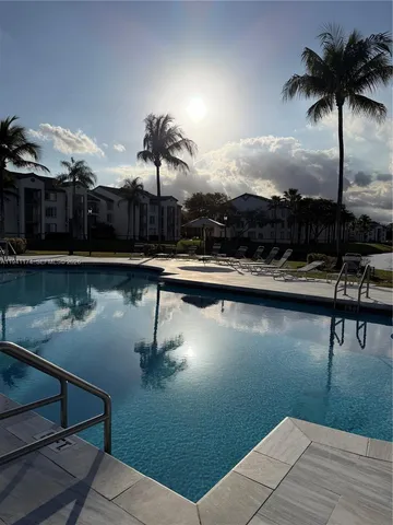 a room with furniture and a large window